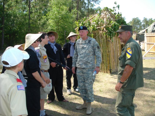 brigadiergeneraljameshschwitterscommandinggeneralspeakswithmembersoftroop100.jpg